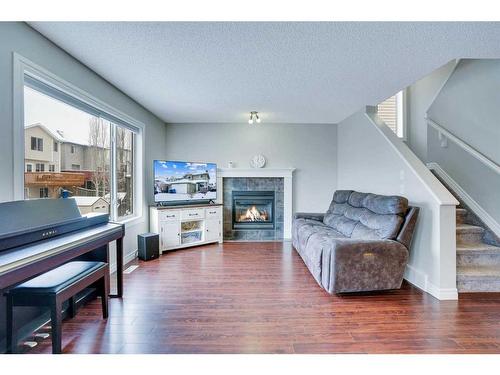 178 Citadel Estates Heights Nw, Calgary, AB - Indoor Photo Showing Living Room With Fireplace