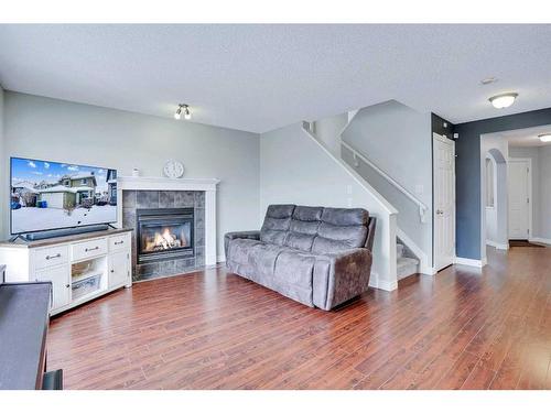 178 Citadel Estates Heights Nw, Calgary, AB - Indoor Photo Showing Living Room With Fireplace