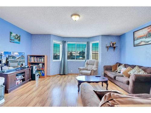 115 Coral Springs Circle Ne, Calgary, AB - Indoor Photo Showing Living Room