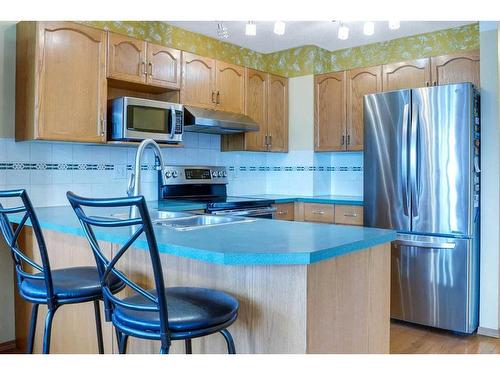 115 Coral Springs Circle Ne, Calgary, AB - Indoor Photo Showing Kitchen With Double Sink