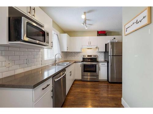 53 Hidden Valley Villas Nw, Calgary, AB - Indoor Photo Showing Kitchen With Stainless Steel Kitchen With Double Sink With Upgraded Kitchen