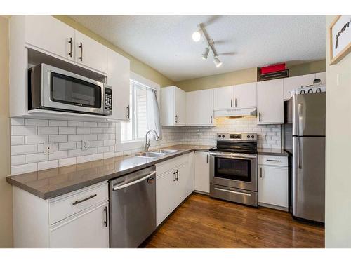 53 Hidden Valley Villas Nw, Calgary, AB - Indoor Photo Showing Kitchen With Stainless Steel Kitchen With Double Sink