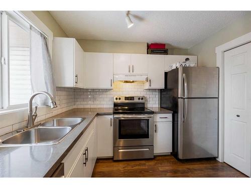 53 Hidden Valley Villas Nw, Calgary, AB - Indoor Photo Showing Kitchen With Stainless Steel Kitchen With Double Sink