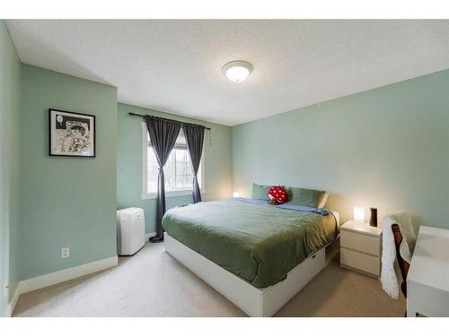 53 Hidden Valley Villas Nw, Calgary, AB - Indoor Photo Showing Bedroom