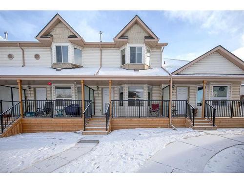 53 Hidden Valley Villas Nw, Calgary, AB - Outdoor With Deck Patio Veranda