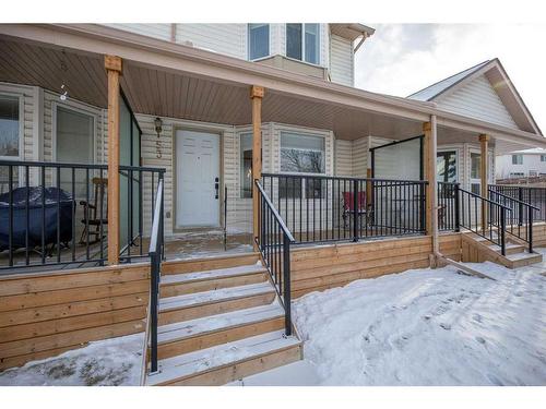 53 Hidden Valley Villas Nw, Calgary, AB - Outdoor With Deck Patio Veranda