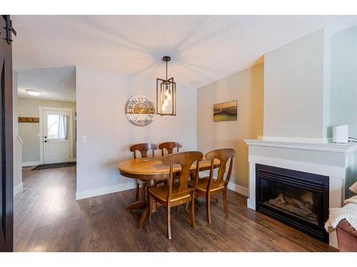 53 Hidden Valley Villas Nw, Calgary, AB - Indoor With Fireplace