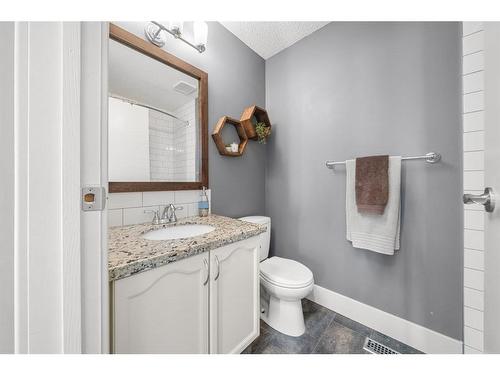 59 Rivercrest Crescent Se, Calgary, AB - Indoor Photo Showing Bathroom