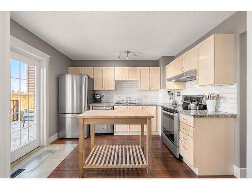 59 Rivercrest Crescent Se, Calgary, AB - Indoor Photo Showing Kitchen With Stainless Steel Kitchen