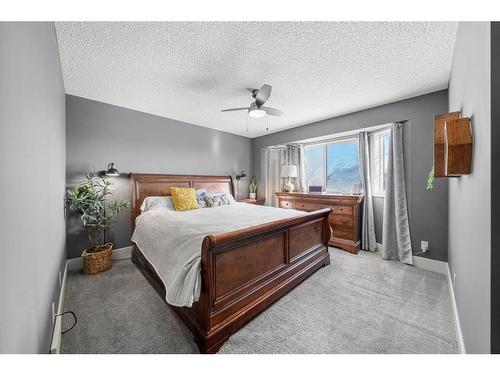 59 Rivercrest Crescent Se, Calgary, AB - Indoor Photo Showing Bedroom