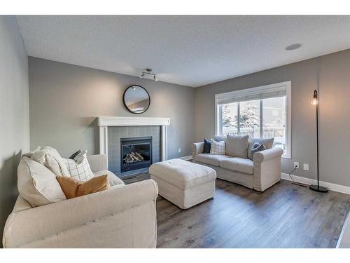 146 Auburn Glen Circle Se, Calgary, AB - Indoor Photo Showing Living Room With Fireplace