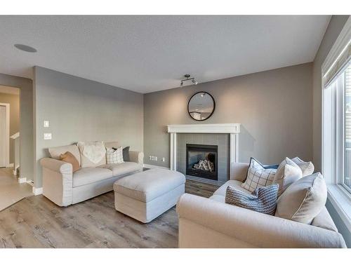 146 Auburn Glen Circle Se, Calgary, AB - Indoor Photo Showing Living Room With Fireplace