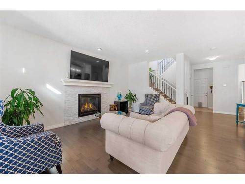 27 Mahogany Passage Se, Calgary, AB - Indoor Photo Showing Living Room With Fireplace