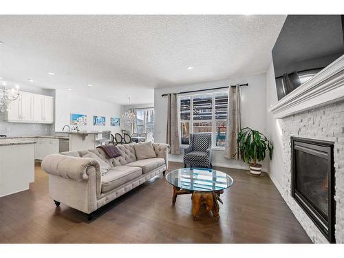 27 Mahogany Passage Se, Calgary, AB - Indoor Photo Showing Living Room With Fireplace