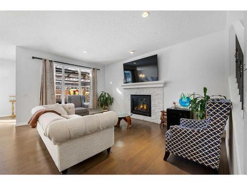 27 Mahogany Passage Se, Calgary, AB - Indoor Photo Showing Living Room With Fireplace