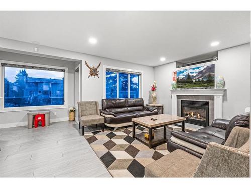 235 California Place Ne, Calgary, AB - Indoor Photo Showing Living Room With Fireplace