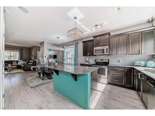 9 Legacy Glen Row Se, Calgary, AB - Indoor Photo Showing Kitchen With Stainless Steel Kitchen With Upgraded Kitchen