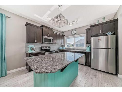 9 Legacy Glen Row Se, Calgary, AB - Indoor Photo Showing Kitchen With Stainless Steel Kitchen With Double Sink With Upgraded Kitchen