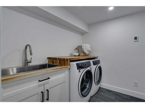 185 Westminster Drive Sw, Calgary, AB - Indoor Photo Showing Laundry Room