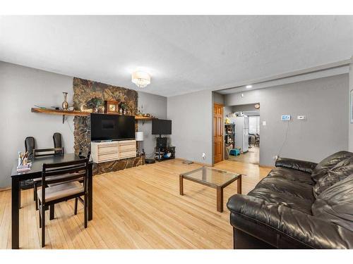 2018 Cottonwood Crescent Se, Calgary, AB - Indoor Photo Showing Other Room With Fireplace