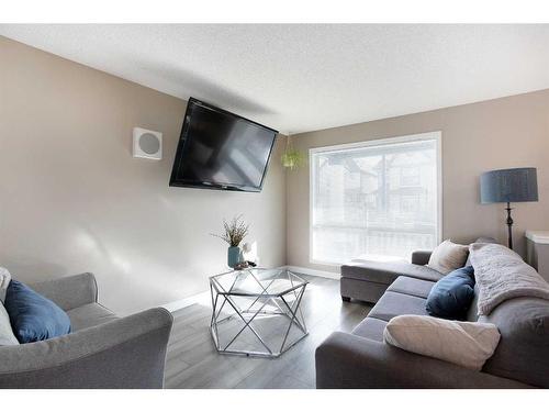 140 Prestwick Heights Se, Calgary, AB - Indoor Photo Showing Living Room