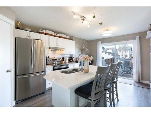 140 Prestwick Heights Se, Calgary, AB - Indoor Photo Showing Kitchen With Double Sink