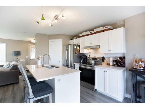 140 Prestwick Heights Se, Calgary, AB - Indoor Photo Showing Kitchen With Double Sink