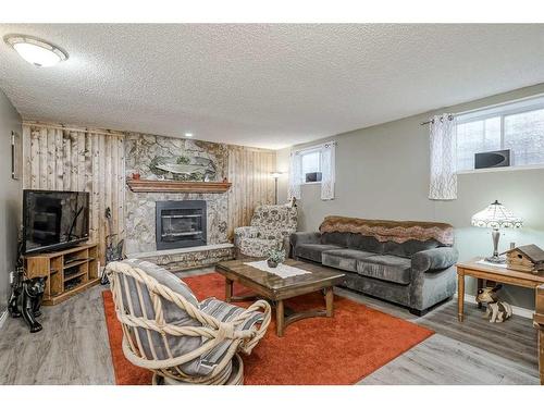 28 Beddington Crescent Ne, Calgary, AB - Indoor Photo Showing Living Room With Fireplace