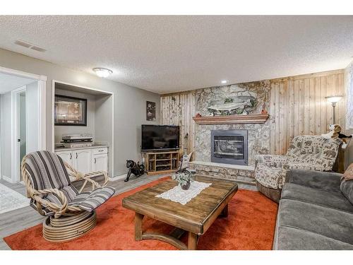 28 Beddington Crescent Ne, Calgary, AB - Indoor Photo Showing Living Room With Fireplace