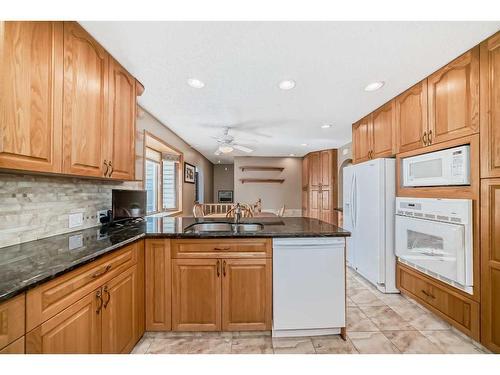 5031 Marian Road Ne, Calgary, AB - Indoor Photo Showing Kitchen With Double Sink