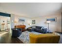 3922 Fonda Way Se, Calgary, AB  - Indoor Photo Showing Living Room 