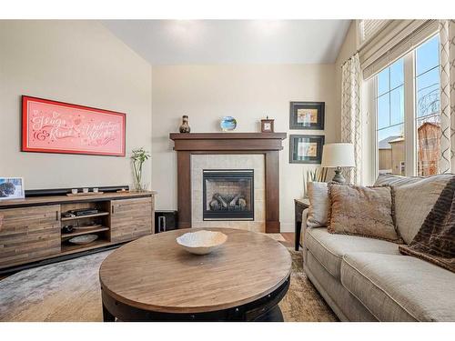 274 Cranleigh Place Se, Calgary, AB - Indoor Photo Showing Living Room With Fireplace