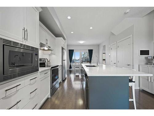 16 Howse Drive Ne, Calgary, AB - Indoor Photo Showing Kitchen With Upgraded Kitchen