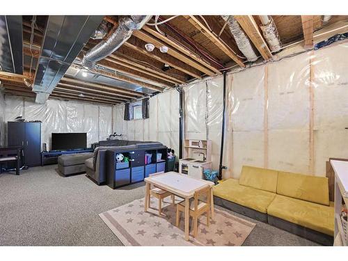 16 Howse Drive Ne, Calgary, AB - Indoor Photo Showing Basement