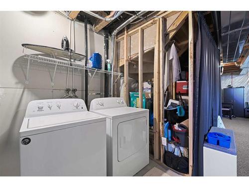 16 Howse Drive Ne, Calgary, AB - Indoor Photo Showing Laundry Room