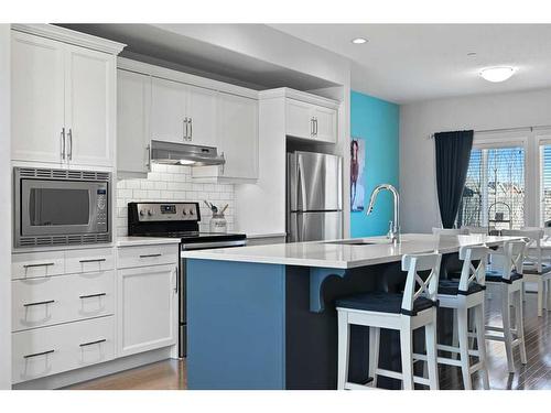 16 Howse Drive Ne, Calgary, AB - Indoor Photo Showing Kitchen With Upgraded Kitchen