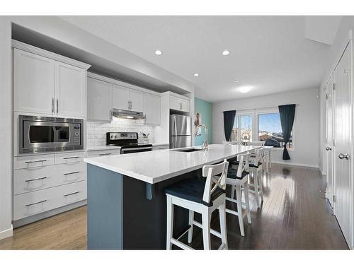 16 Howse Drive Ne, Calgary, AB - Indoor Photo Showing Kitchen With Upgraded Kitchen