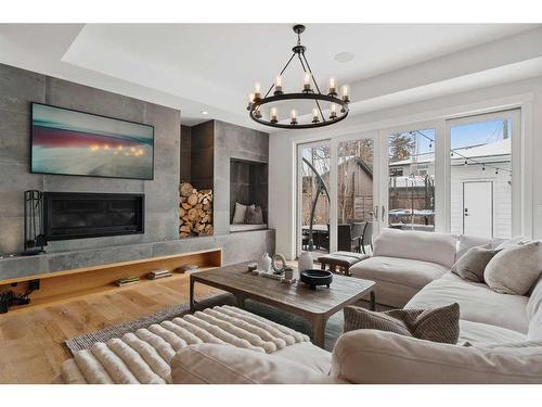 2005 48 Avenue Sw, Calgary, AB - Indoor Photo Showing Living Room With Fireplace