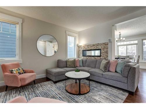 3808 Sarcee Road Sw, Calgary, AB - Indoor Photo Showing Living Room With Fireplace