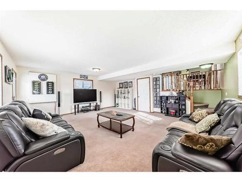 311 Mt Aberdeen Close Se, Calgary, AB - Indoor Photo Showing Living Room