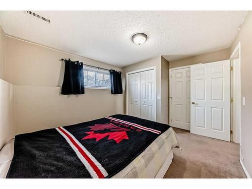 311 Mt Aberdeen Close Se, Calgary, AB - Indoor Photo Showing Bedroom