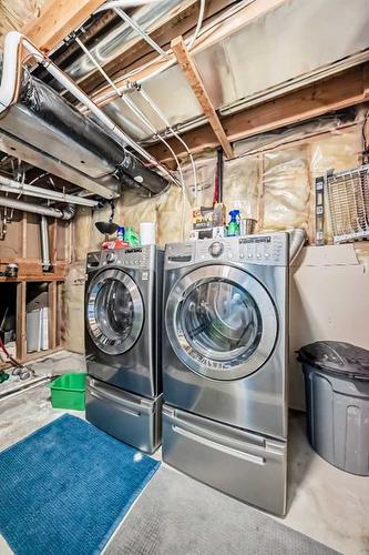 311 Mt Aberdeen Close Se, Calgary, AB - Indoor Photo Showing Laundry Room