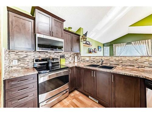 311 Mt Aberdeen Close Se, Calgary, AB - Indoor Photo Showing Kitchen With Double Sink With Upgraded Kitchen