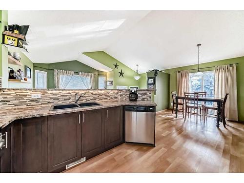 311 Mt Aberdeen Close Se, Calgary, AB - Indoor Photo Showing Kitchen With Double Sink