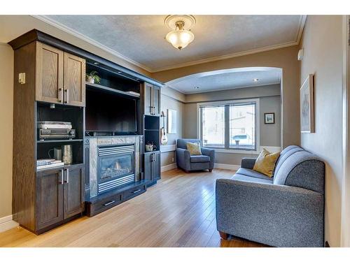 2105 Westmount Road Nw, Calgary, AB - Indoor Photo Showing Living Room With Fireplace