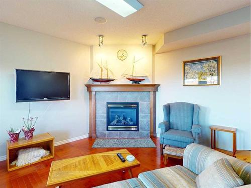 84 Kincora Terrace Nw, Calgary, AB - Indoor Photo Showing Living Room With Fireplace