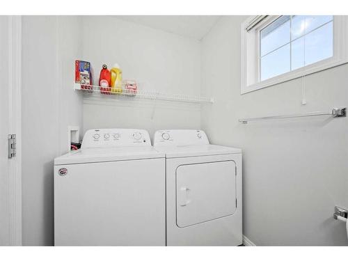 27 Copperfield Court Se, Calgary, AB - Indoor Photo Showing Laundry Room