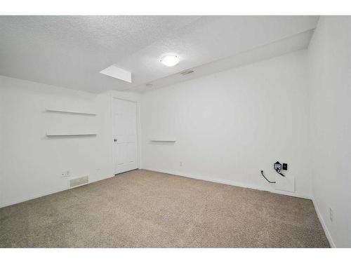 27 Copperfield Court Se, Calgary, AB - Indoor Photo Showing Other Room