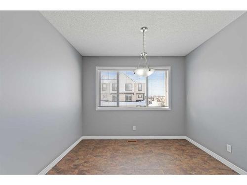 153 Everhollow Heights Sw, Calgary, AB - Indoor Photo Showing Other Room