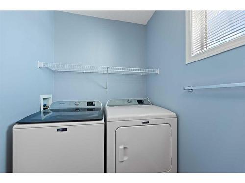 153 Everhollow Heights Sw, Calgary, AB - Indoor Photo Showing Laundry Room